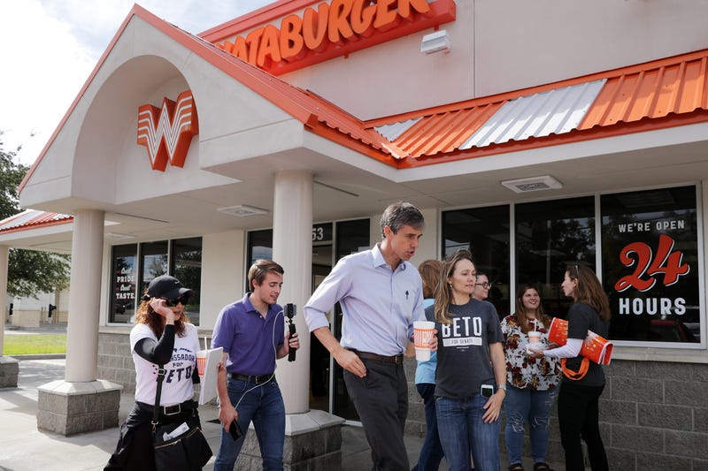 Rep. Beto O'Rourke (D-TX) (C), his Logistics and Events Manager Cynthia Cano (L), campaign Communications Director Chris Evans and O'Rourke's sister Charlotte O'Rourke head back out to canvass after lunch at a Whataburger November 3.