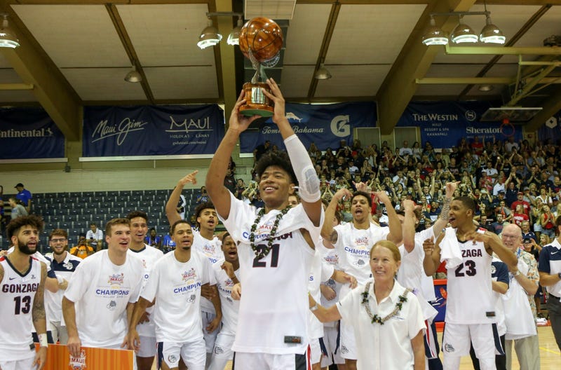 Rui Hachimura holds up the tournament MVP trophy after the 2018 Maui Invitational in Lahaina, Hawaii on November 21, 2018