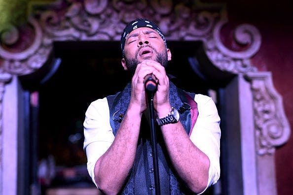 Jussie Smollett performs onstage during amfAR Dance2Cure at Bardot on December 1, 2018 in Hollywood, California.