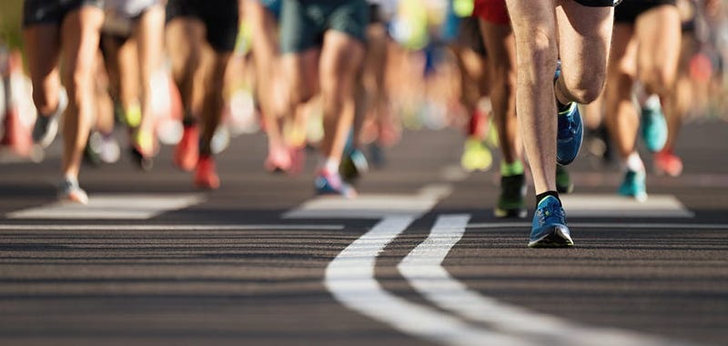 People running a race. 