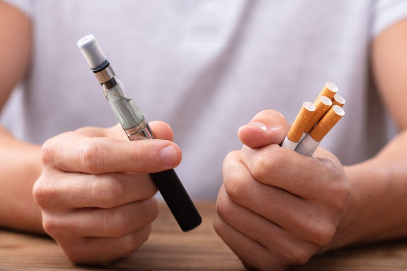 vape pen and cigarettes