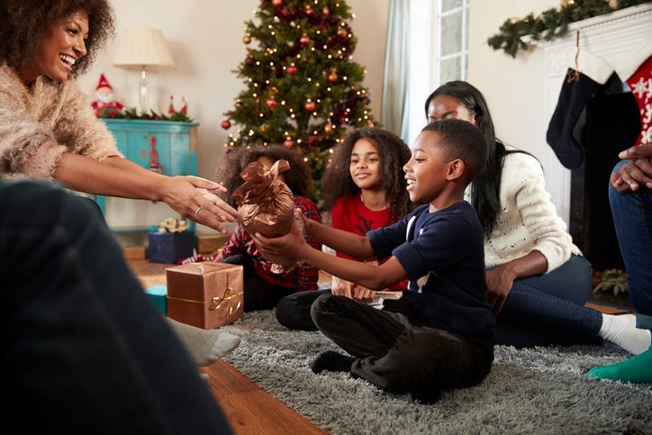 A family giving gifts on Christmas. 