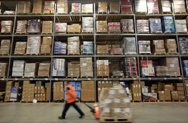 SWANSEA, WALES - NOVEMBER 26: Staff at the Amazon Swansea fulfilment centre process orders as they prepare for what is expected to be their busiest Christmas on record on November 26, 2010 in Swansea, Wales.