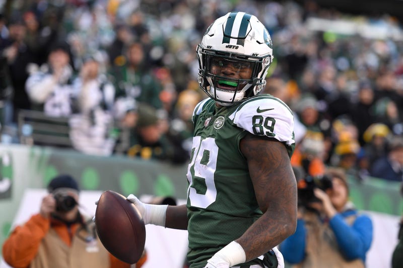 Chris Herndon #89 of the New York Jets reacts after scoring a touchdown against the Green Bay Packers