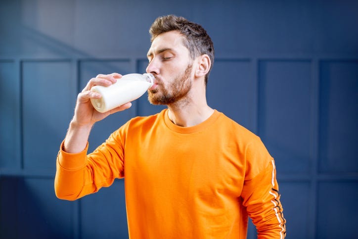 Man Drinking Milk