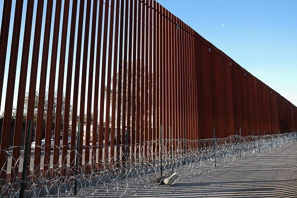A steel and concertina wire barrier runs along the border of the United States and Mexico on January 26, 2019 in Calexico, California. The U.S. government had been partially shut down as President Donald Trump battled congress for $5.7 billion in funding
