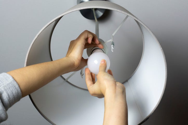 Changing light bulb