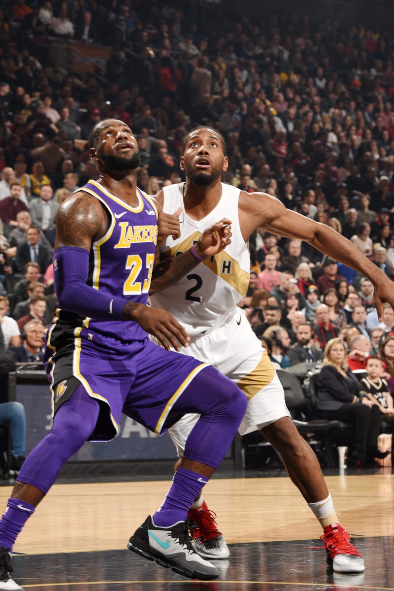 Lakers forward LeBron James and Raptors forward Kawhi Leonard