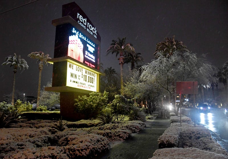 Snow falls outside the Red Rock Casino during a winter storm on February 20, 2019 in Las Vegas, Nevada.