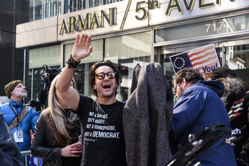 Brandon Straka, founder of the 'WalkAway' movement, (C) attends a rally in support of U.S. President Donald Trump near Trump Tower on March 23, 2019 in New York City.
