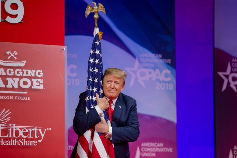 President Trump Hugs the Flag