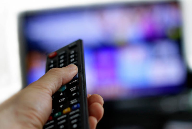 watching television