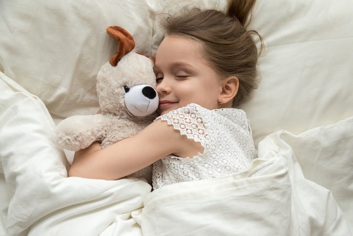 A young girl sleeping.