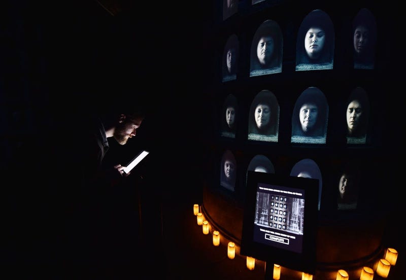 Invited guests use an interactive display which allows their face to be displayed alongside cast members at the Game Of Thrones: The Touring Exhibition launch at Titanic Exhibition Centre on April 10, 2019 in Belfast, Northern Ireland.
