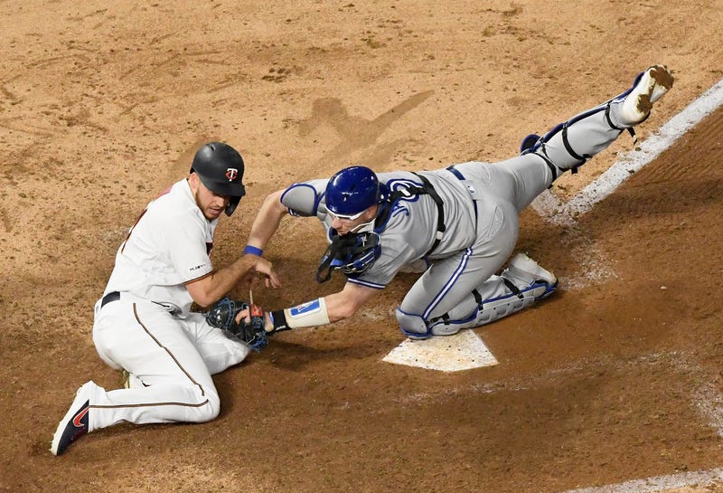 Danny Jansen tags out CJ Cron