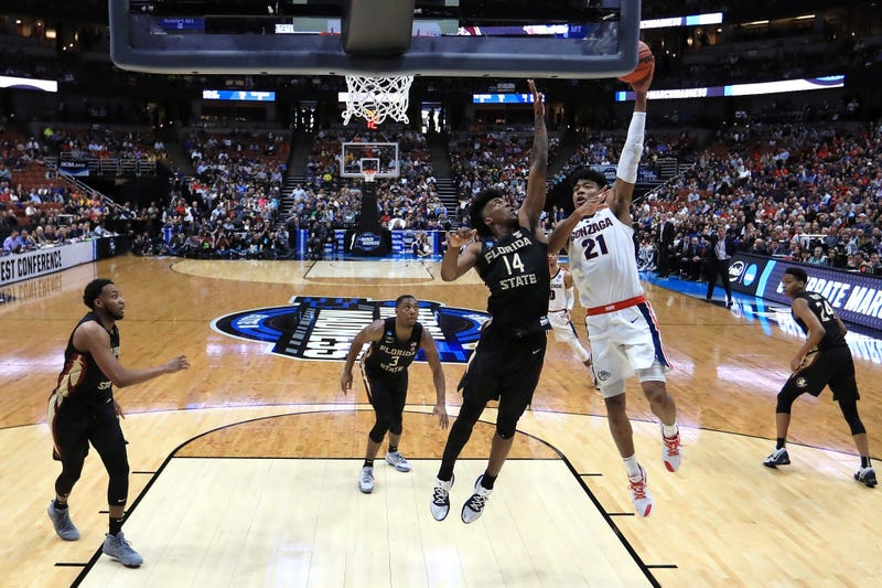 Rui Hachimura drives to the basket against Terance Mann of Florida State in the 2019 NCAA Men's Basketball Tournament