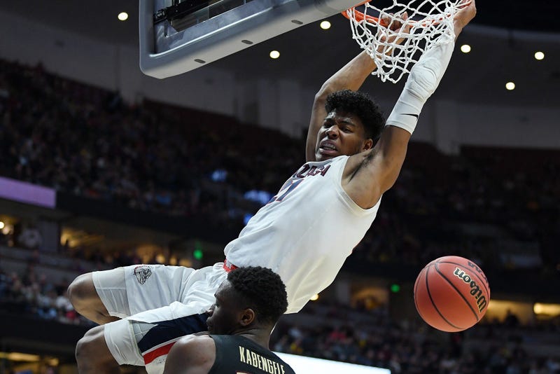 Rui Hachimura dunks on Mfiondu Kabengele of Florida State during the 2019 NCAA Men's Basketball Tournament