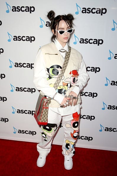 Billie Eilish gets photographed at an awards show.