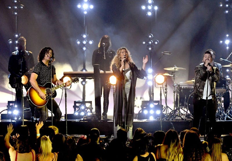 Dan + Shay, Tori Kelly perform onstage during the 2019 Billboard Music Awards at MGM Grand Garden Arena on May 01, 2019 in Las Vegas, Nevada.