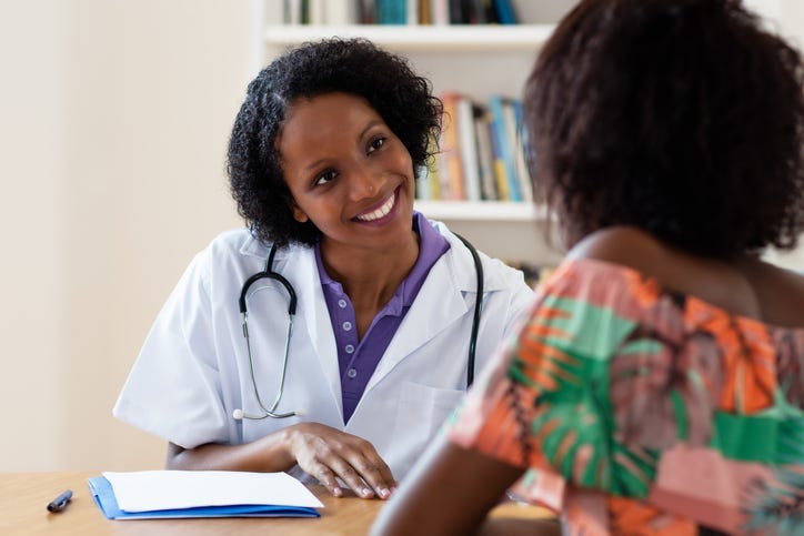 A doctor and a patient. 