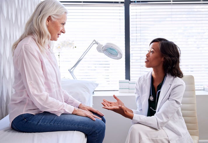 Doctor meeting with patient