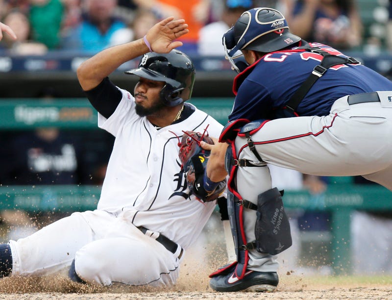 Twins catcher Jason Castro is late with the tag on Dawel Lugo
