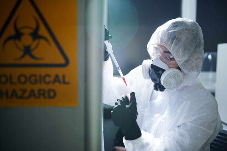laboratory scientist in protective workwear,