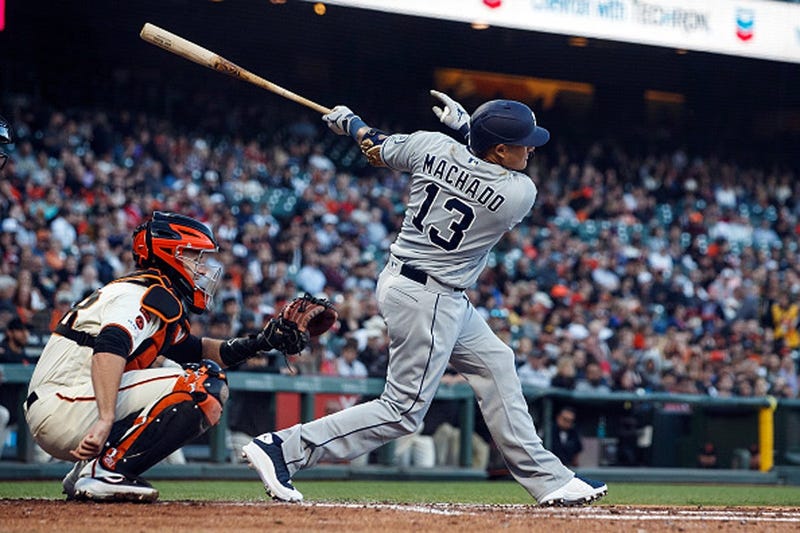 Manny Machado #13 of the San Diego Padres hits a single against the San Francisco Giants during the third inning at Oracle Park on June 12, 2019 in San Francisco, California. (Photo by Jason O. Watson/Getty Images)