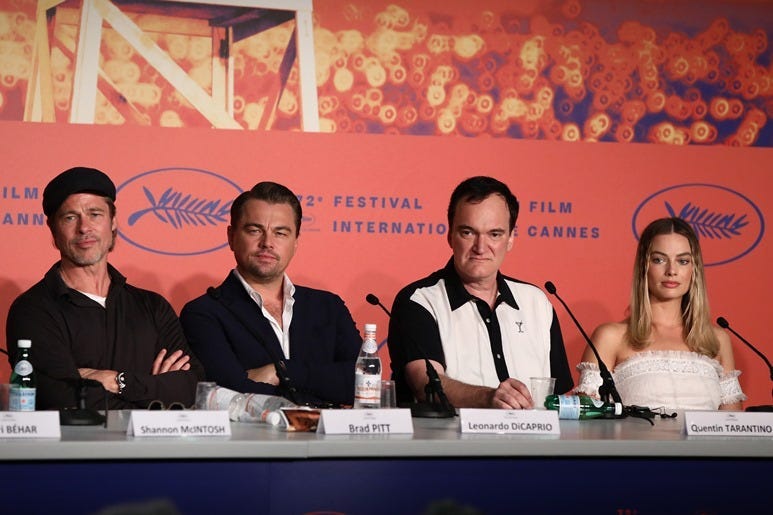 CANNES, FRANCE - MAY 22: Brad Pitt, Leonardo DiCaprio, Quentin Tarantino and Margot Robbie attend the "Once Upon A Time In Hollywood" Press Conference during the 72nd annual Cannes Film Festival on May 22, 2019 in Cannes, France
