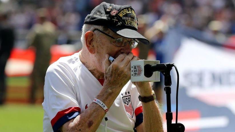 WATCH: 96-year-old World War II veteran plays national anthem on harmonica before U.S. women’s soccer game