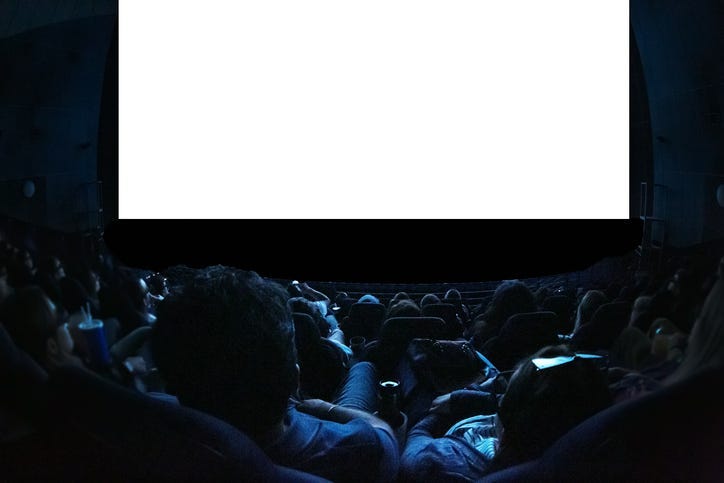 People watching a movie. 