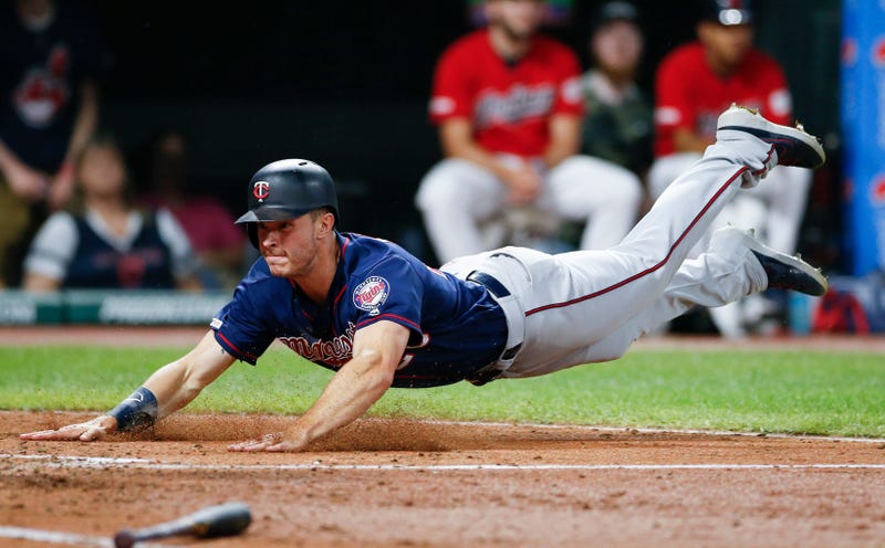 Max Kepler dives for the go-ahead run