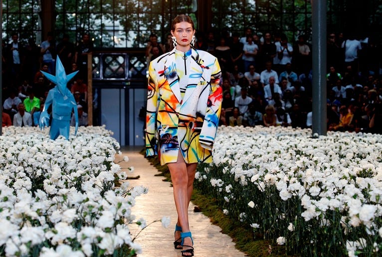 US model Gigi Hadid walks the runway during the Off-White Menswear Spring Summer 2020 show as part of Paris Fashion Week on June 19, 2019 in Paris, France.