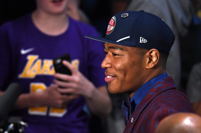 Rui Hachimura reacts after being drafted with the ninth overall pick by the Washington Wizards