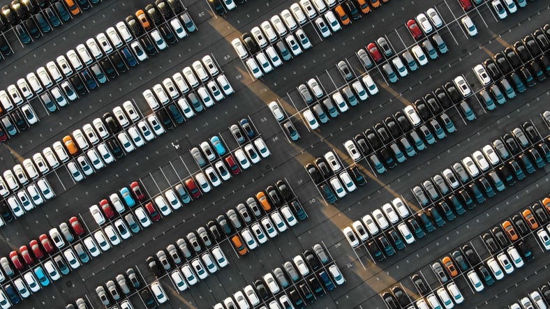 car-dealer-lot-GettyImages-1158232690.jpg