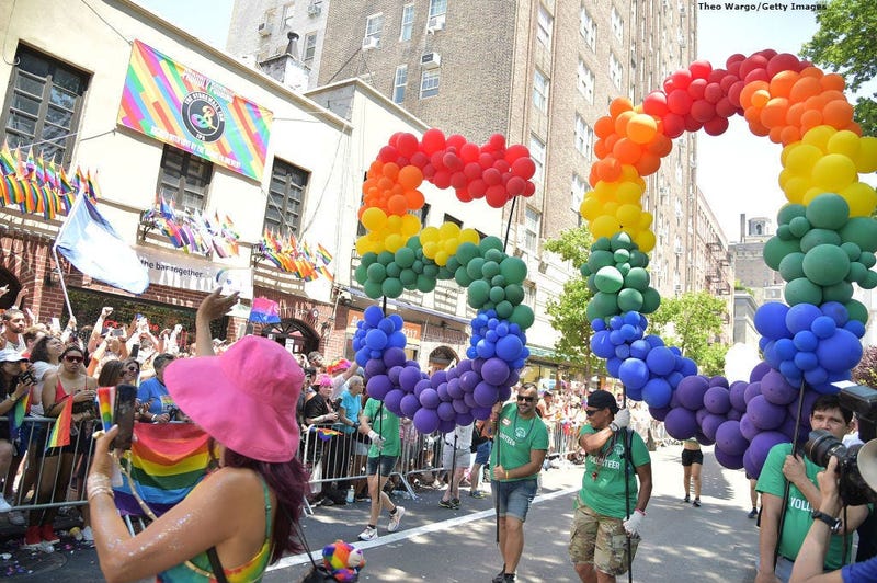 Part of the NYC Pride March moves past the Stonewall Inn in New York's Greenwich Village.