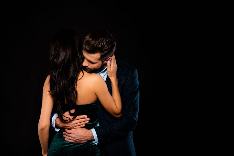 Men Smelling Woman
