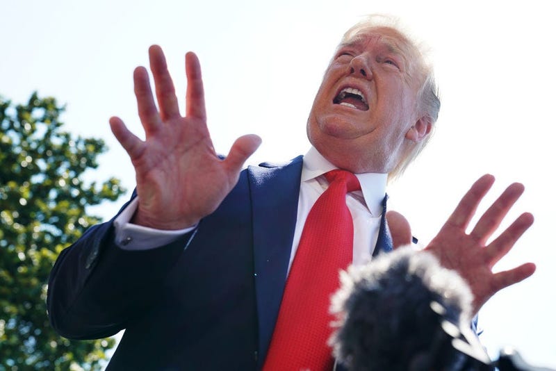 President Donald Trump speaks to members of the media prior to his departure from the White House