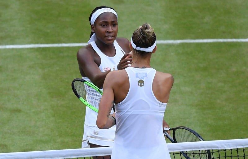 Cori Gauff of The United States celebrates shakes hands with Polona Hercog of Slovenia after her Ladies' Singles third round match against during Day five of The Championships - Wimbledon 2019