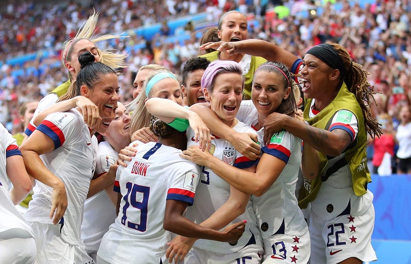 Megan Rapinoe of the USA celebrates with teammates after scoring her team's first goal during the 2019 FIFA Women's World Cup France Final match between The United States of America and The Netherlands at Stade de Lyon on July 07, 2019 in Lyon, France.