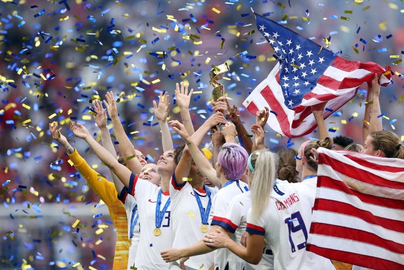 Carli Lloyd of the USA celebrate with the trophy following victory in the 2019 FIFA Women's World Cup France Final match between The United States of America and The Netherlands at Stade de Lyon on July 07, 2019 in Lyon, France. 