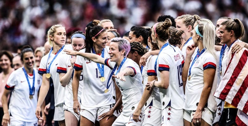 Megan Rapinoe of the USA celebrates with team mates following her team's victory in the 2019 FIFA Women's World Cup France Final match between The United States of America and The Netherlands