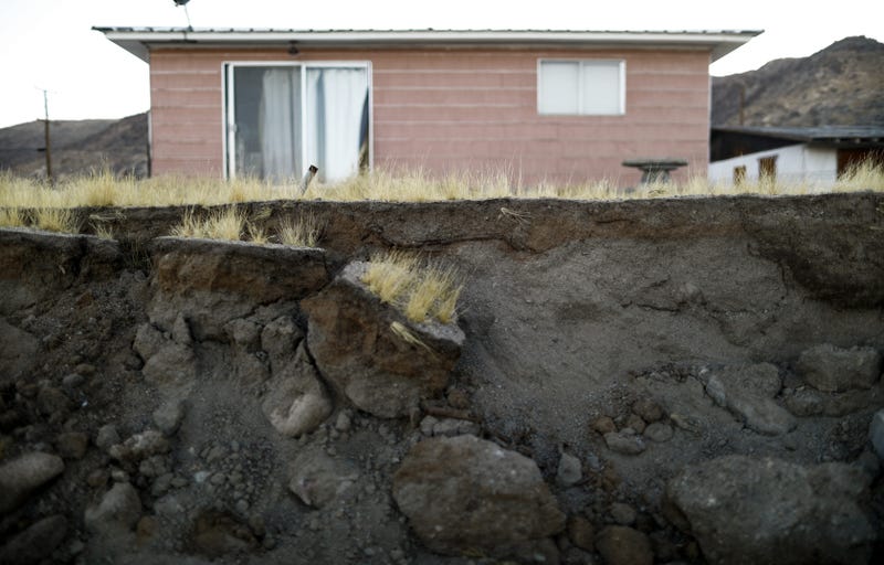 Cinderblocks from a toppled wall are scattered outside the Eldridge family home, which has been deemed uninhabitable due to structural damage from the recent 7.1 magnitude earthquake, on July 8, 2019.