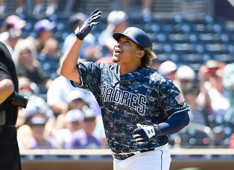 Josh Naylor #22 of the San Diego Padres looks skyward after hitting a solo home during the third inning of a baseball game against the Colorado Rockies at Petco Park August 11, 2019 in San Diego, California. (Photo by Denis Poroy/Getty Images)