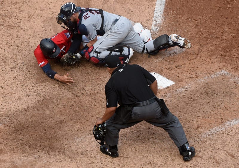 Indians throw out Adrianza at the plate