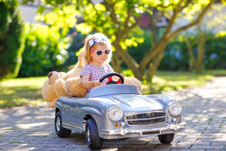 Kid Driving a Car