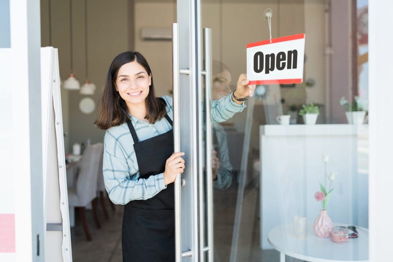 Woman opening restaurant