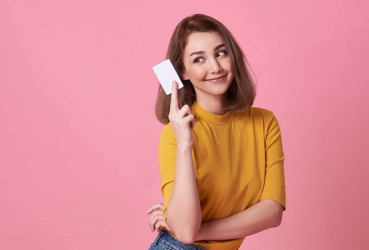 Woman holding credit card