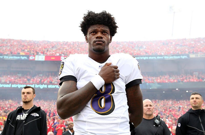 EPTEMBER 22: Quarterback Lamar Jackson #8 of the Baltimore Ravens stands during the national anthem before their game against the Kansas City Chiefs at Arrowhead Stadium on September 22, 2019 in Kansas City, Missouri. (Photo by Jamie Squire/Getty Images)