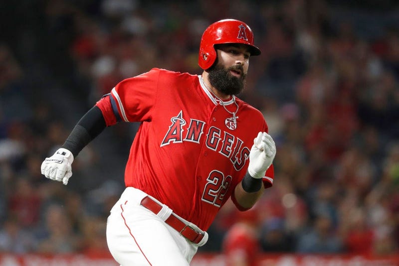 Kaleb Cowart #22 of the Los Angeles Angels of Anaheim runs to first base after hitting an RBI double during the seventh inning of a game against the Oakland Athletics at Angel Stadium of Anaheim on September 25, 2019 in Anaheim, California. 